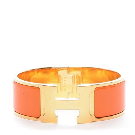 hermes bracelet ressort orange|Hermes orange enamel bangle bracelet.